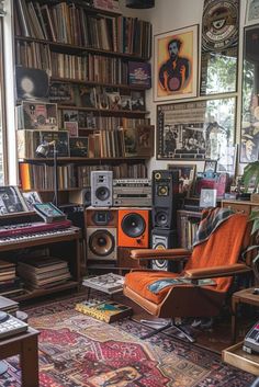 a room filled with lots of books and audio equipment