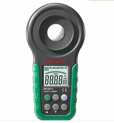 an image of a digital multimeter with thermometer on it's side