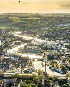 an aerial view of a city and river