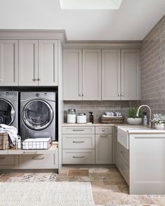 a washer and dryer sitting in a kitchen