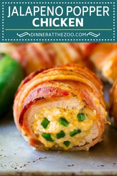 bacon wrapped in cheese and green onions on a baking sheet with text overlay that reads jalapeno popper chicken