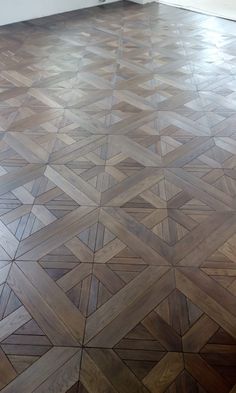 an image of a wood floor that looks like it has been made out of tiles