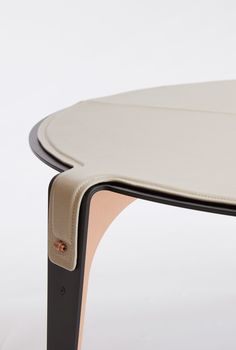 The Bardot Coffee Table features a simplified silhouette with beautiful curves and angles. It displays a Black metal frame with sleek contrasting hardware and a French Pebbled Vegan Leather top. Gabriel Scott, Leather Coffee Table, Plywood Furniture, Interior Modern, Furniture Details, Interior Furniture, Step Stool, Cool Furniture, Modern Furniture