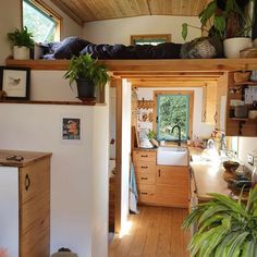 the kitchen is clean and ready to be used as a living room or dining area