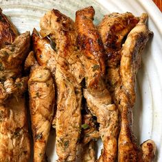 grilled chicken wings on a white plate