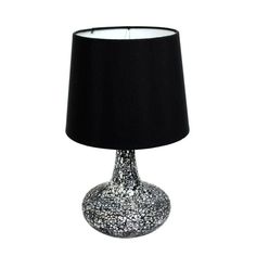 a table lamp with a black shade on it