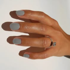 For Flocks Sake is a muted taupe hue, pictured here the single polished hand of a model with squoval shaped nails.  An elegant diamond ring is on her ring finger.  The image is clean and crisp with a white background to support this clean beauty nail polish. Simple Manicure Short Nails, Short Coloured Nails, Simple Manicure Ideas For Short Nails, Nail Color For Olive Skin Tone, Nails For Blondes, Short Nail Colours, January Nail Colors 2024, Nail Short Ideas, Really Simple Nails