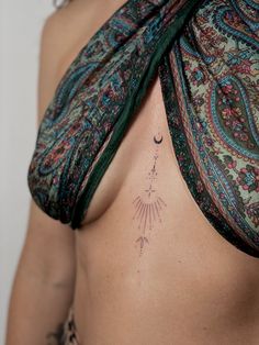 a woman with a tattoo on her chest