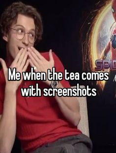 a man sitting in front of a poster with the words me when the tea comes with screenshots