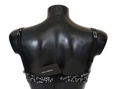 Indulge in the luxury of Italian craftsmanship with this exquisite Dolce & Gabbana black floral lace silk stretch bra. Designed for the modern woman, it boasts both elegance and comfort, perfect for elevating your lingerie collection. Its intricate lace detailing and premium silk blend material seamlessly blend sensuality with sophistication. Complete with the iconic logo detail, this bra is a statement of style and luxury, directly from the fashion capital of Italy. Material: 10% Cotton, 6% Ela Silk Bra, Bra Materials, High Heel Stiefel, Lace Silk, Dolce E Gabbana, Womens Bras, Print Models, Lingerie Collection, Dolce & Gabbana