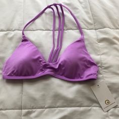 Nwt. Never Worn. Trouble In Paradise. Lilac Jewel. Removable Pads. Multiple Loop Holes In Strap For Adjustment. Vertical Spaghetti Straps Are Moveable. Matching Bottoms In A Separate Listing. Bundle To Save. Purple Triangle Halter Top For Beach, Summer Underwire Bra In Purple, Summer Purple Bra With Padded Cups, Beach Triangle Top Bra With Padded Cups, Summer T-back Bra With Adjustable Straps, Seamless Strappy Halter Top For The Beach, Beach Bra With Adjustable Straps And Stretch, Summer Purple Underwire Bra, Purple Underwire Summer Bra