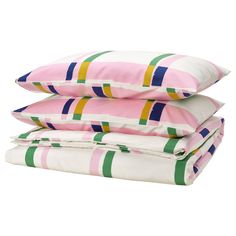 three pillows stacked on top of each other in pink, green and yellow stripes with white background