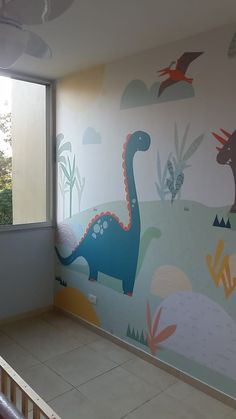 a child's room painted with dinosaurs and plants