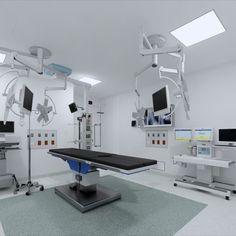 a hospital room with multiple monitors and medical equipment on the walls, including an operating table