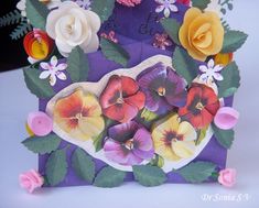 a purple bag with flowers and leaves on it