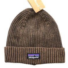 Elevate your cold-weather style with the Patagonia Beanies. Crafted for street wearers adventurers, this cozy headwear combines sustainable warmth with rugged outdoor charm. Made from premium cotton, it's a must-have for eco-conscious explorers. Stay warm, look cool, and embrace sustainable fashion with Patagonia.      Fabric:       100% cotton     One size fit all. Casual Weatherproof Winter Hat, Warm Midweight Hat For Outdoor Activities, Lightweight Cotton Hat For Outdoor, Lightweight Casual Hiking Hats, Warm Brown Hat For Outdoor Activities, Brown Hat For Outdoor Fall Activities, Casual Midweight Hats For Outdoor Activities, Warm Brown Hats For Outdoor Activities, Brown Hat For Fall Outdoor Activities