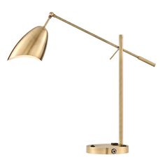 a gold desk lamp on a white background with the light turned off and one arm extended