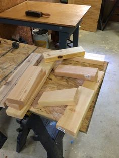 the workbench is being worked on with wood