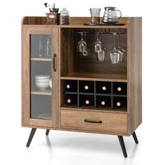 a wooden cabinet with wine glasses on it