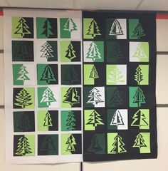 two green and white christmas trees are on the wall next to black and white squares