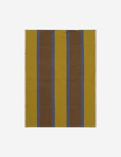 a brown and blue striped towel on a white background