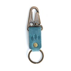 Aqua*Short | leather logo branded keychain Brass Keyring, Aqua Shorts, Portland Leather Goods, Ring Minimal, Leather Hides, Tree Logo, Tree Logos, Leather Hide, Granola Girl