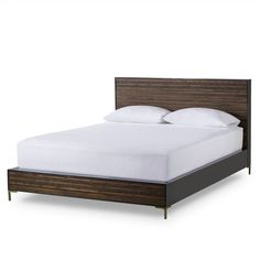 a bed with white sheets and wooden headboard on it's side, against a white background