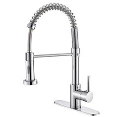 a kitchen faucet with chrome finish and pull out sprayer, on an isolated white background