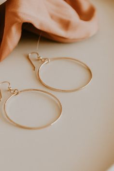 Bold Hammered Hoops Our Bold Hammered Hoops are simple while still making a statement. Featuring a slightly hammered texture, they are made to catch the light through your daily activities. Earrings measure approximately 1 3/4" in diameter. Available in 14k Gold Fill and Sterling Silver. Statement Bracelet, Daily Activities, Gold Filled, Texture, Sterling Silver, Silver, Gold