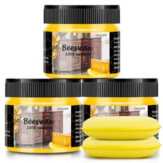 three jars of beeswax yellow wax next to each other