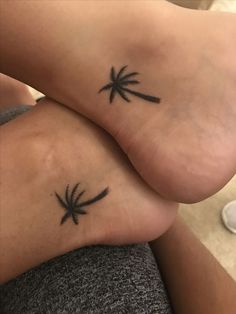 two people with matching tattoos on their legs