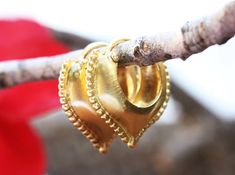 "Ornamented solid yellow gold hoop earrings. Our Rustic Gold Hoop Earrings are a special take on ornamental jewelry! These oriental-style hoops feature a scalloped, beaded edge and an Eastern-themed teardrop shape. These earrings are elaborate and delicate but still very noticeable. They have a very eye-catching rustic look that will elevate any outfit. Because they are made-to-order, your recipient can rest assured that they'll be the only ones wearing these gorgeous hoop earrings! This is a gr Unique Gold Earrings, Gold Earrings Indian, Creole Earrings, Bali Earrings, Beaded Edge, Alternative Jewelry, Earrings Indian, Vintage Style Earrings, Earrings Antique