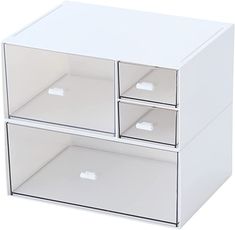 three drawers are stacked on top of each other, with one drawer open and the other closed