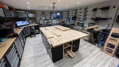 a large workbench with many tools on it