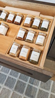 glass spice containers with bamboo lid in kitchen drawer with bamboo spice rack Bamboo Spice Rack, House Organisation, Apartment Organization, Optimize Space, Organization Inspiration