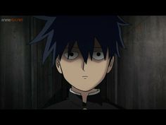 an anime character with black hair standing in a dark room, staring at the camera