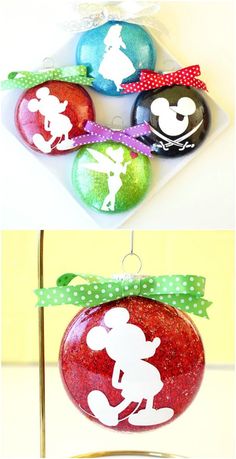 christmas ornaments with mickey mouse and minnie mouse silhouettes on them