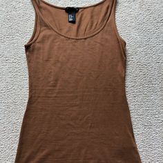 New Without Tags. H&M Camel Brown Tank Top. Size Xs Fall Casual Cami Tank Top, Casual Fall Cami Tank Top, Casual Cami Tank Top For Fall, Casual Brown Camisole For Summer, Seamless Sleeveless Tank Top For Fall, Fall Sleeveless Camisole, Trendy Brown Vest For Summer, Trendy Brown Summer Vest, H&m Tank Top For Spring