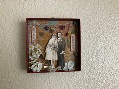 an altered photograph of a man and woman in wedding attire with flowers on the wall