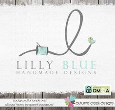 the logo for lily blue handmade designs is displayed on a wooden background with an image of a bird