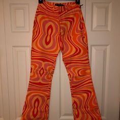 Xs, Red, Orange, Peach, Retro Pants They Have Never Been Worn. Retro Flare Fitted Bottoms, Casual Fitted Red Bottoms, Casual Red Flare Pants, Red Fitted Casual Pants, Casual Fitted Red Pants, Multicolor Bottoms With Retro Print For Spring, Multicolor Casual Bottoms With Retro Print, Casual Multicolor Bottoms With Retro Print, Vibrant Stretch Bottoms