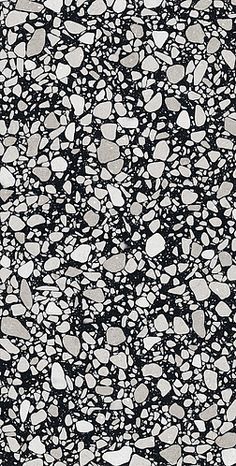 an abstract black and white background with small rocks