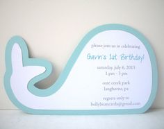 a blue and white whale shaped birthday card with the words garn's 1st birthday on it