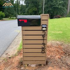 a mailbox sitting on the side of a road