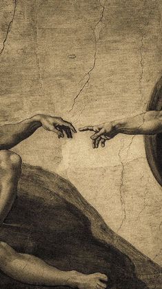 two hands reaching out to touch each other in front of a painting on the wall