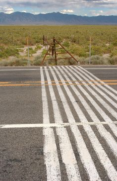 an empty road in the middle of nowhere