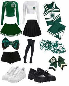 a group of green and white outfits with cheerleader's clothes on them,