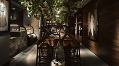 a dining room with wooden tables and plants in the center, along with pictures on the wall