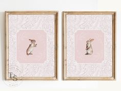 two framed pictures with rabbits on them in front of a white wall and pink background