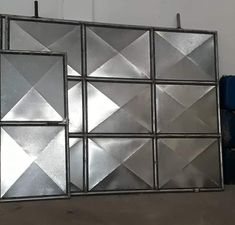 some metal squares are on the wall